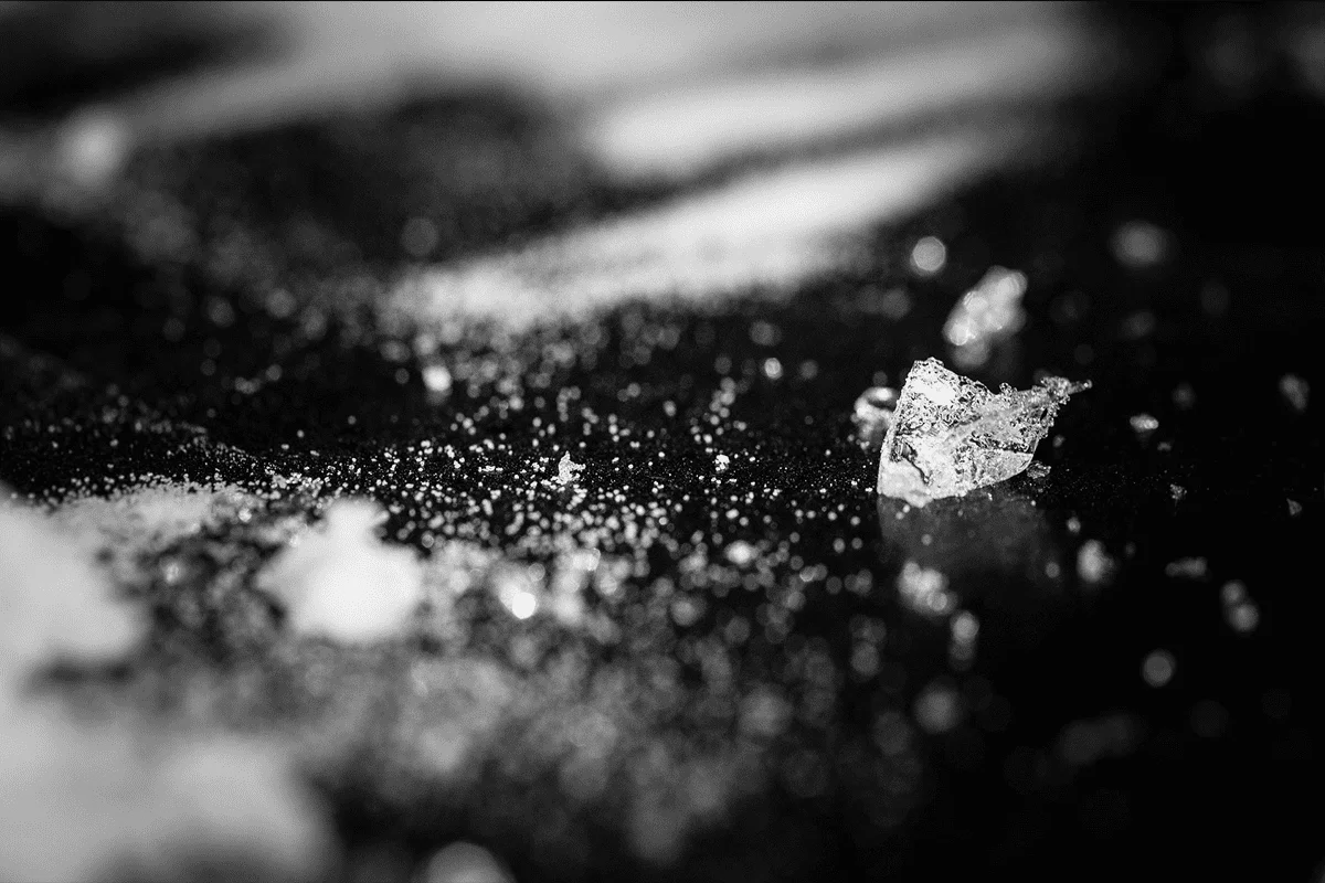 Close-up of crystal meth on dark surface