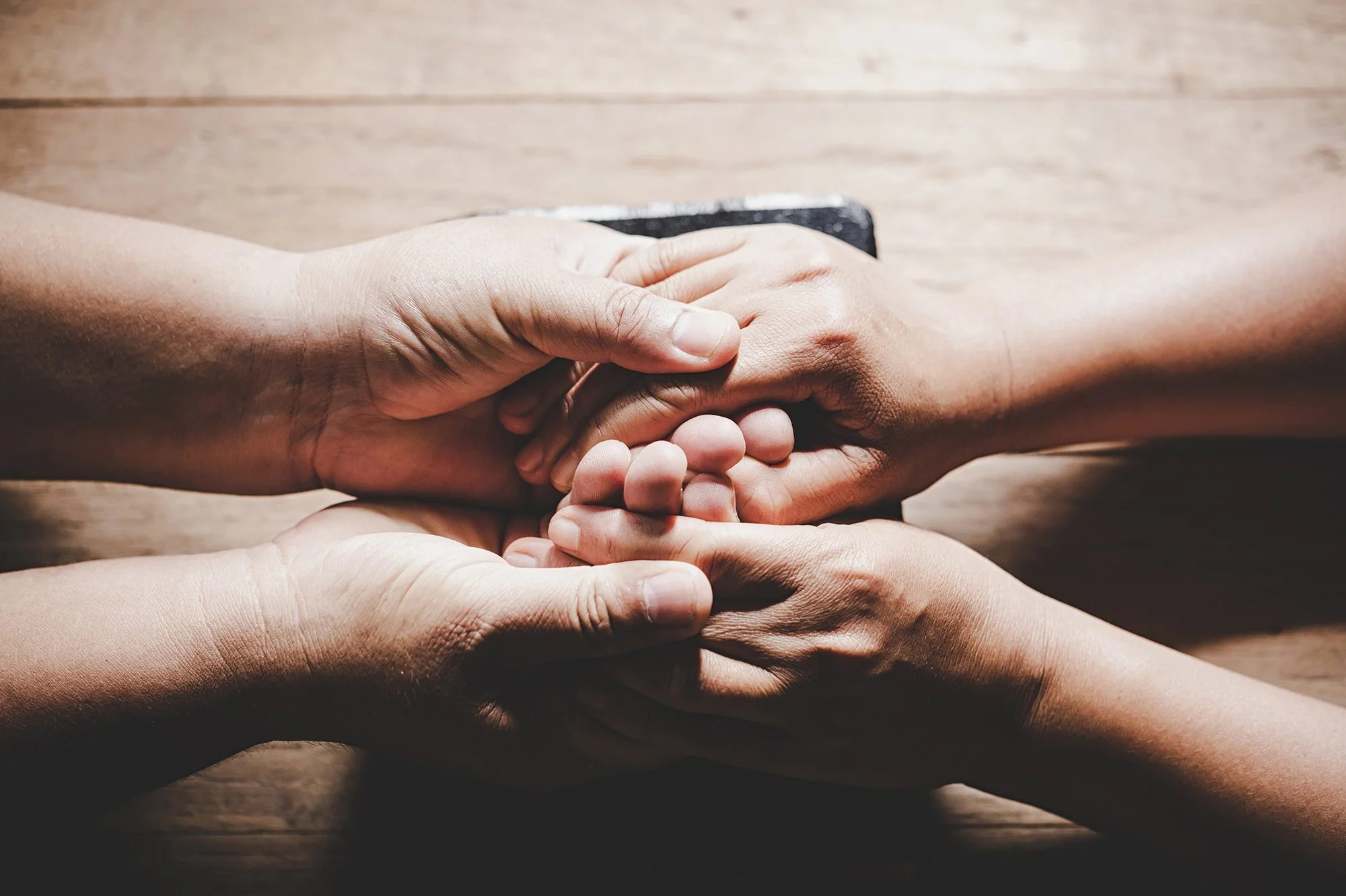 Holding Hands Offering Support and Comfort